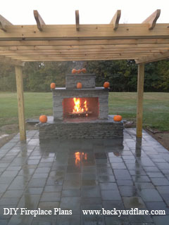 DIY Outdoor Fireplace under pergola