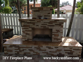 DIY Outdoor Fireplace under pergola