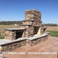 DIY Outdoor Fireplace with storage and seating