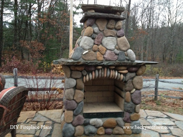 DIY Outdoor Fireplace with river rock veneer